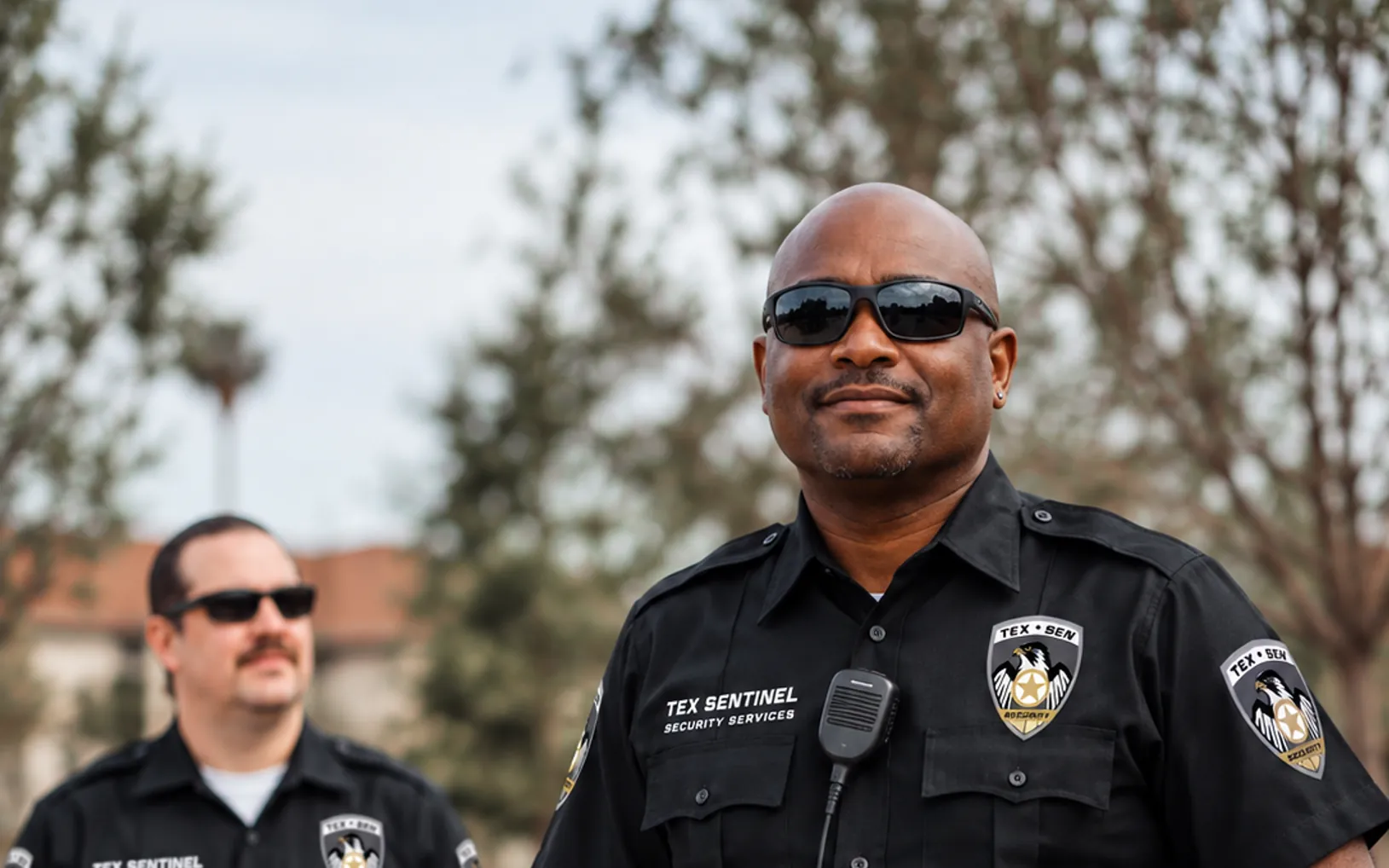 Unarmed security officer greeting visitors